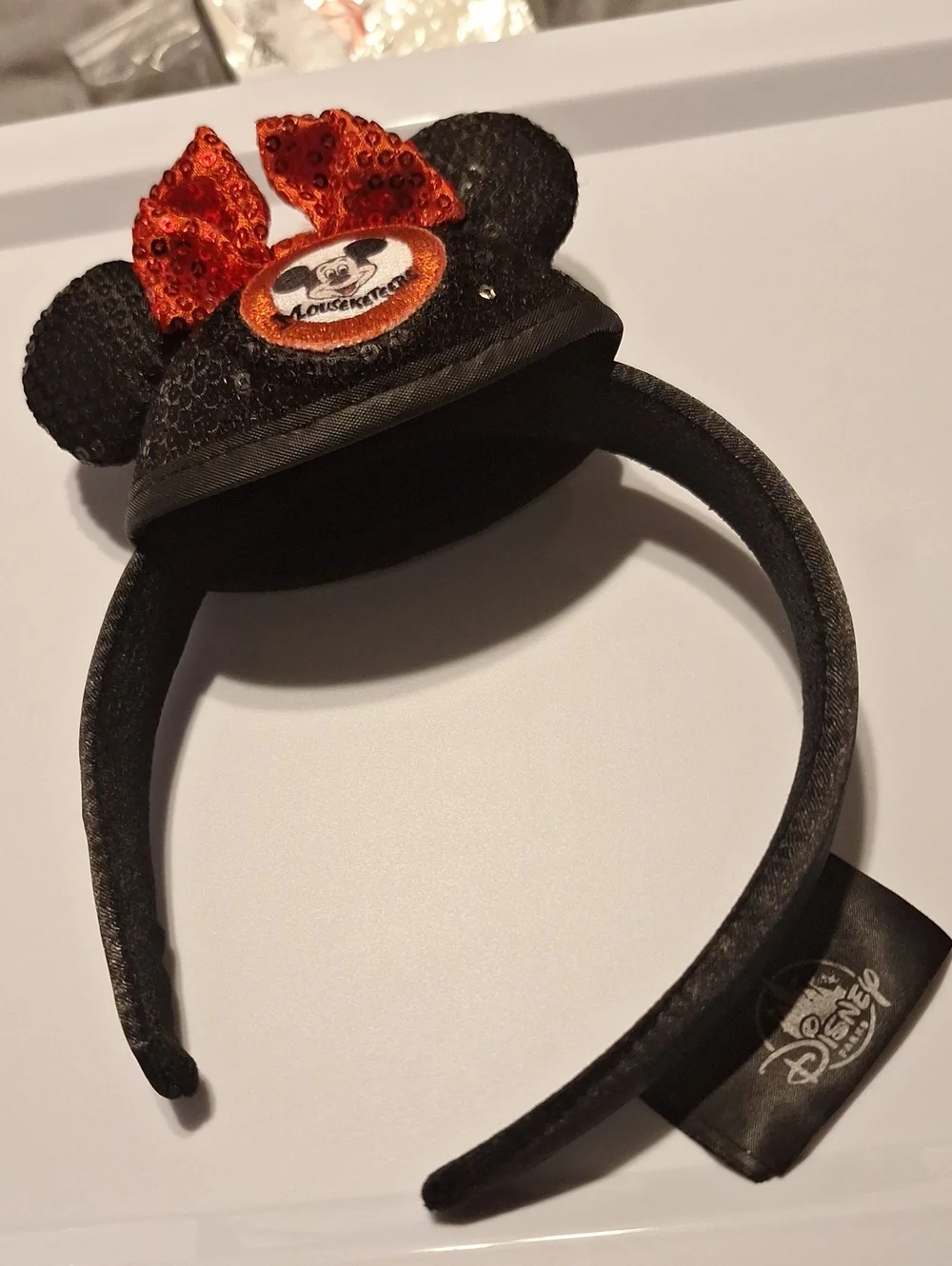 Disney Black Sequin Minnie Ear Headband with Orange Sequin Bow